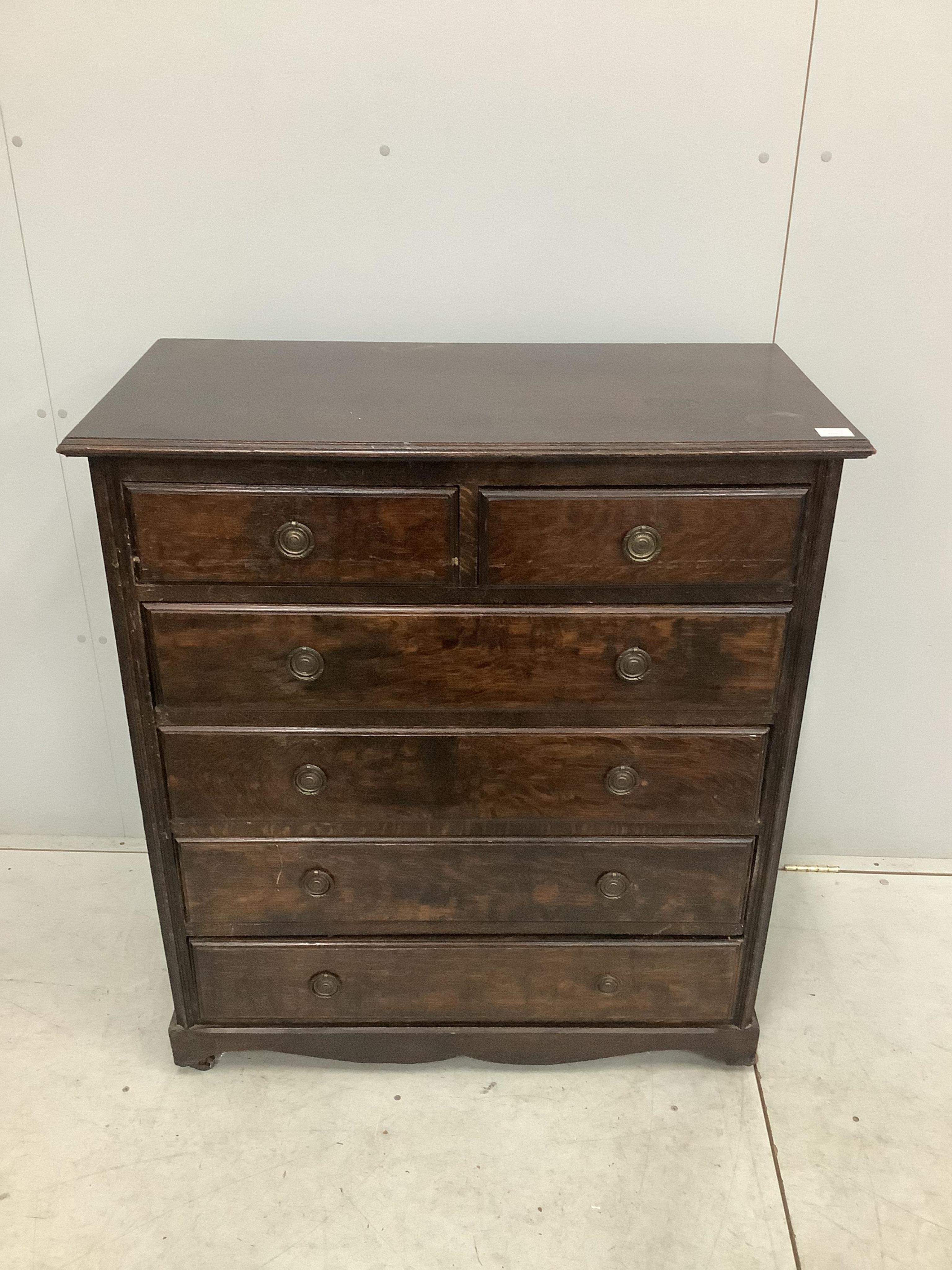 An early 20th century oak chest of drawers, width 96cm, depth 47cm, height 108cm. Condition - fair